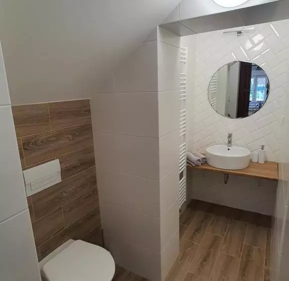 Apartmány černý Kohout