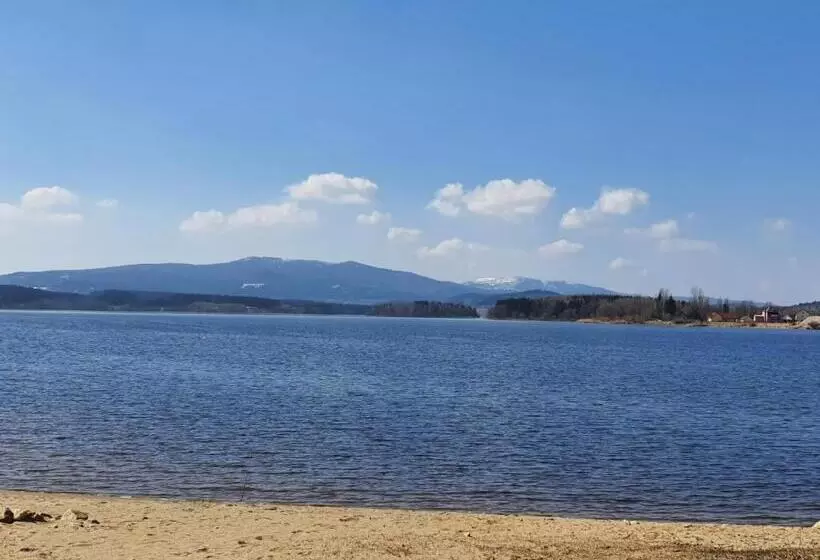 Apartmány černý Kohout