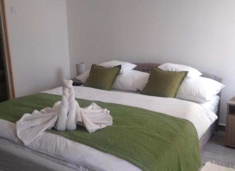 Kaptárkő Apartmanház