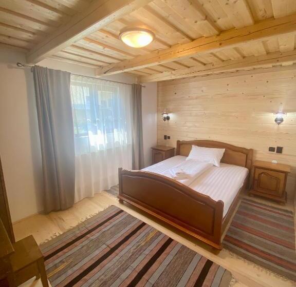 ペンション Căsuța Din Povești