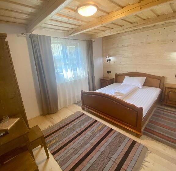 ペンション Căsuța Din Povești