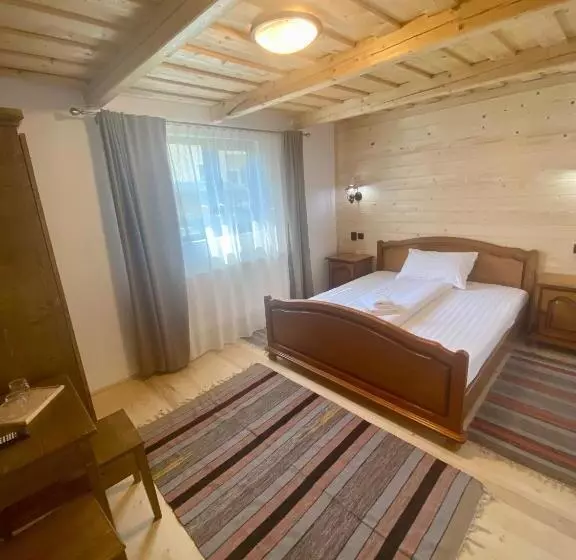 ペンション Căsuța Din Povești