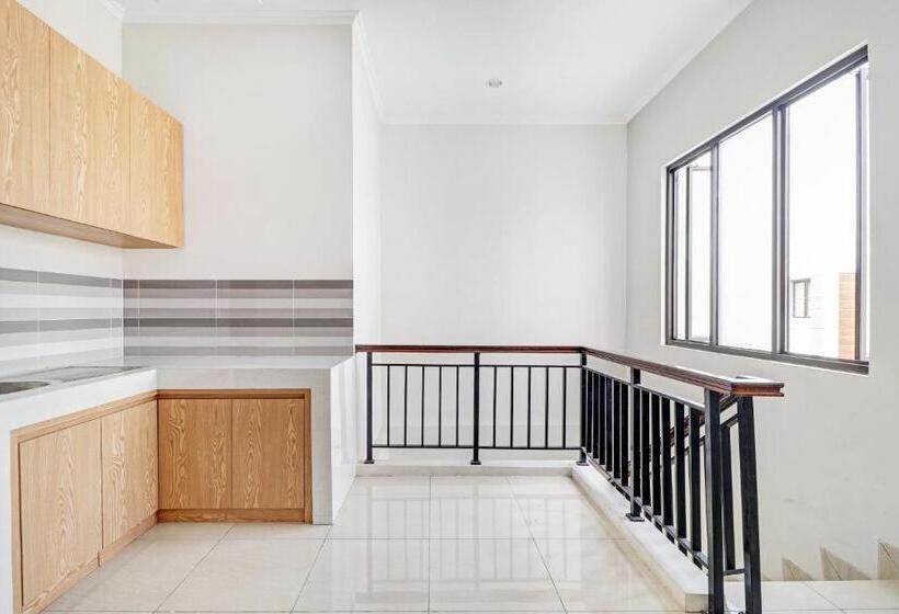 هتل Oyo 90688 Marta Residence