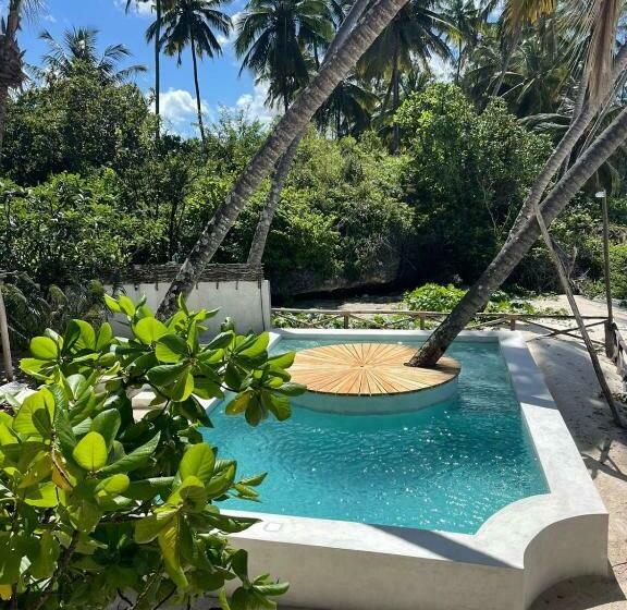 Kima Serviced Beach House & Suites