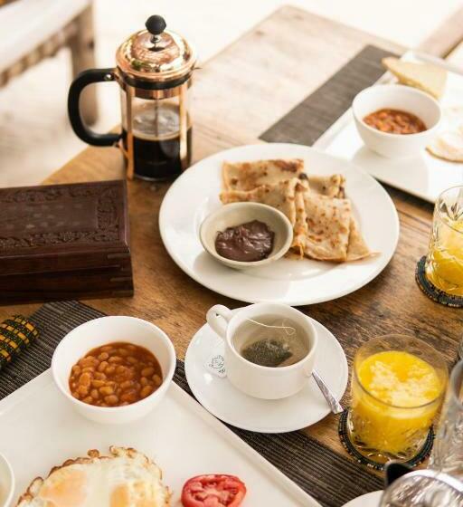 Kima Serviced Beach House & Suites