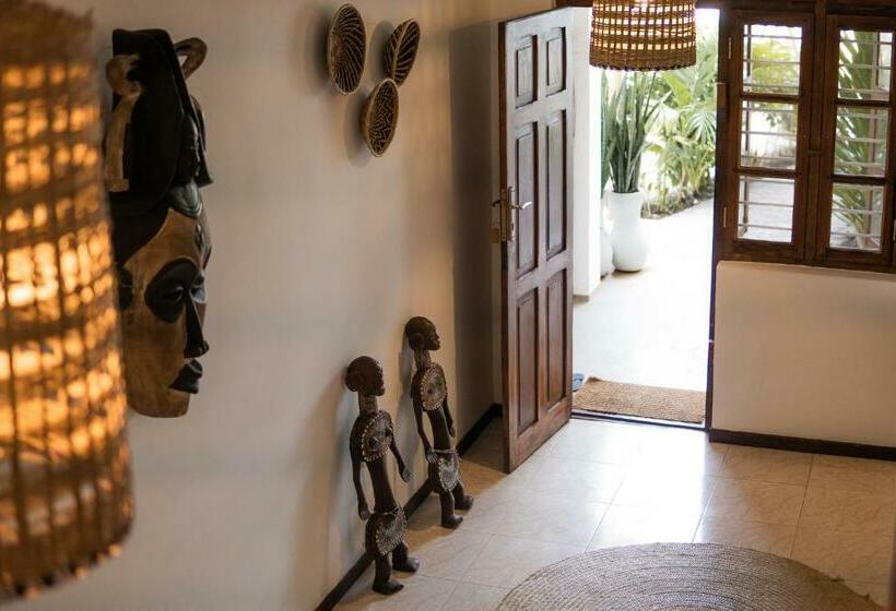 Kima Serviced Beach House & Suites