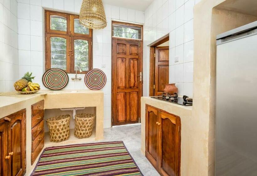 Kima Serviced Beach House & Suites