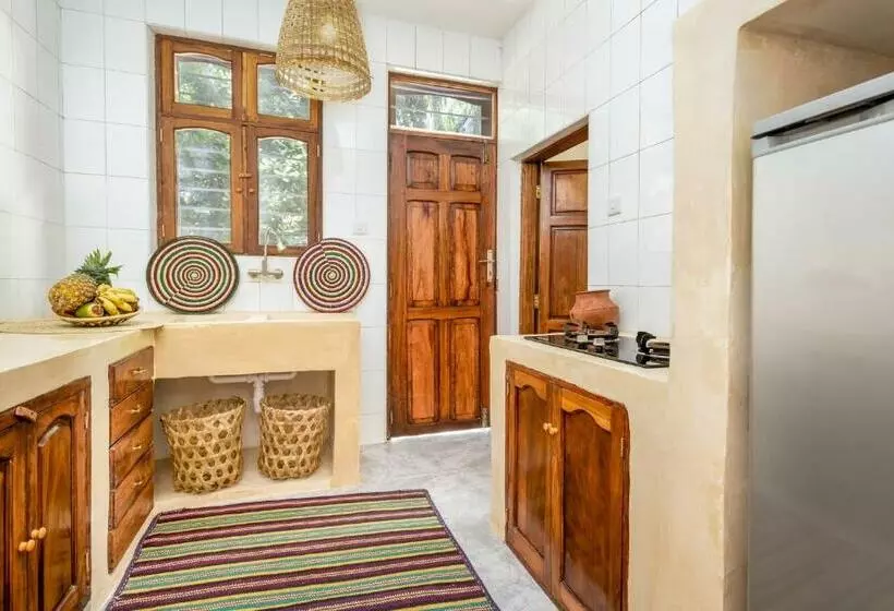 Kima Serviced Beach House & Suites