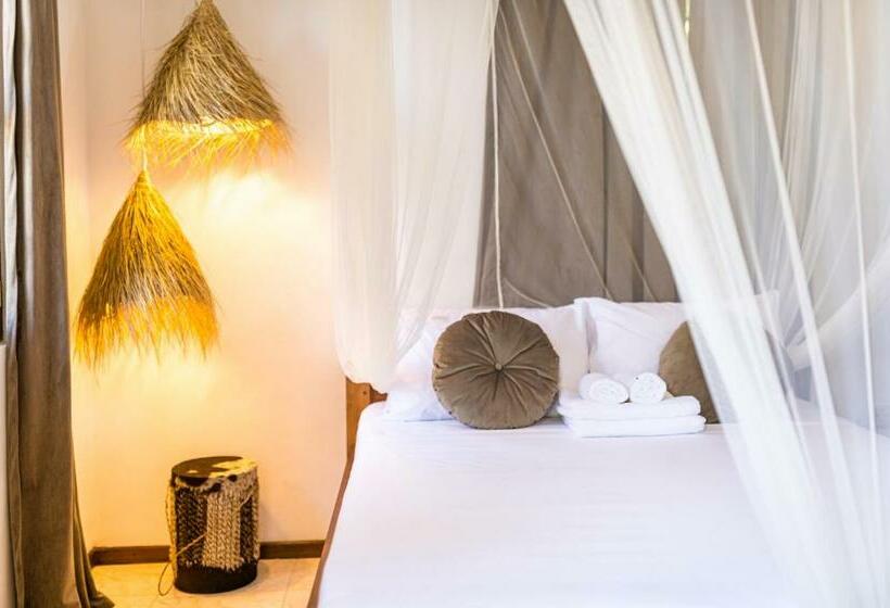 Kima Serviced Beach House & Suites