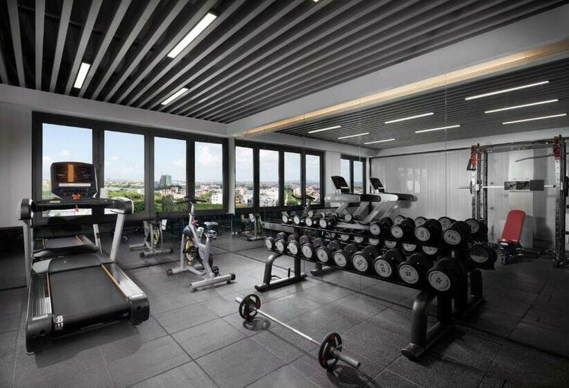 Отель Ramada Encore By Wyndham Jiusuo Downtown