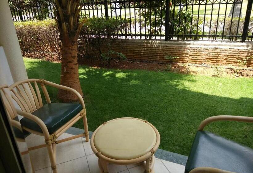 בית מלון כפרי Palm Meadows Resort