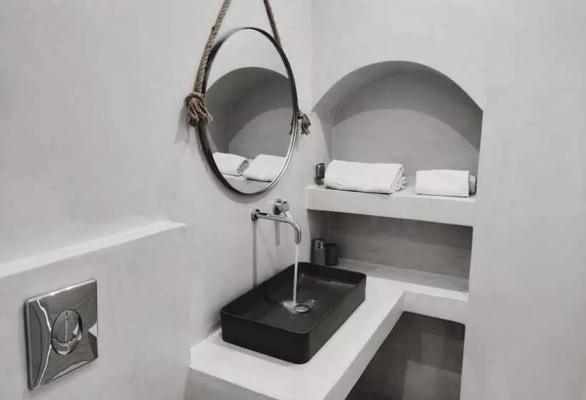 Отель Fira Cave Suites