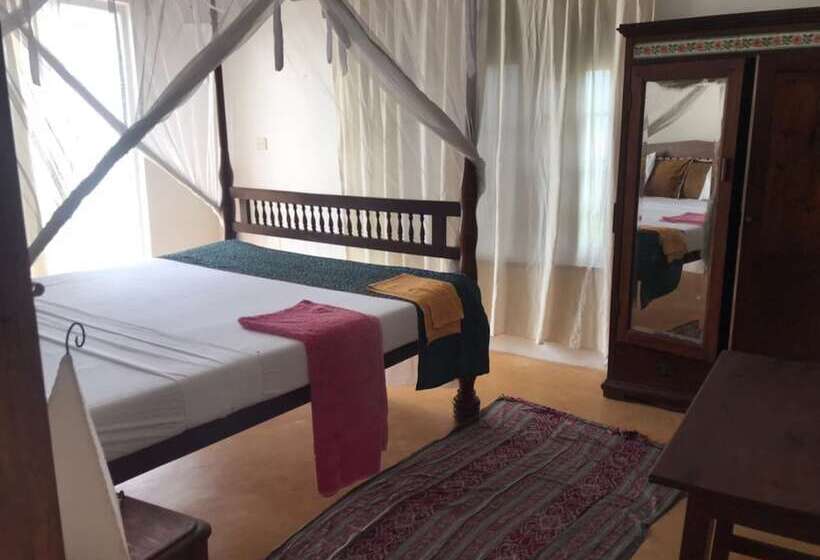 تختخواب و صبحانه Shela Bahari