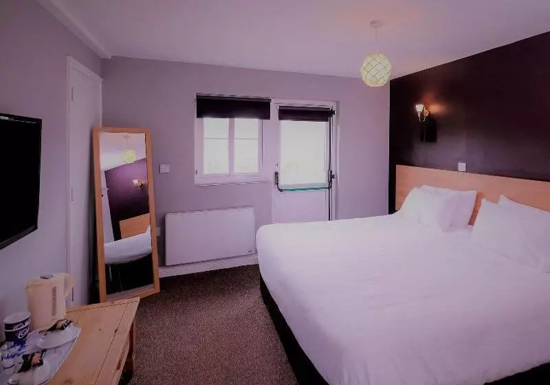 בית מלון כפרי The Woolpack Inn