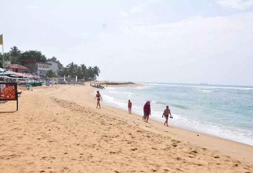 בית מלון כפרי Surf Una Beach