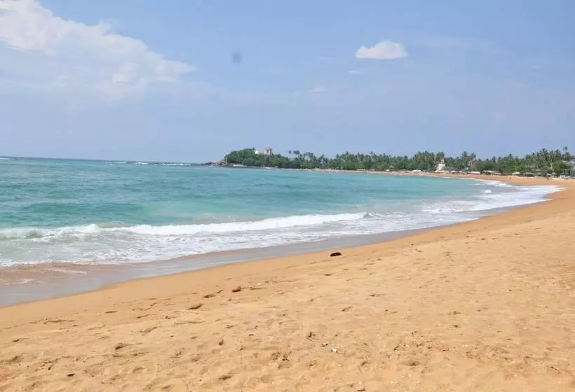 בית מלון כפרי Surf Una Beach
