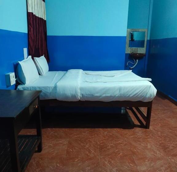 בית מלון כפרי Om Baga Residency Inn