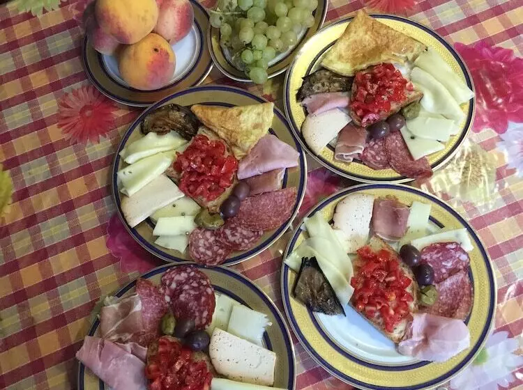 تختخواب و صبحانه Da Rosa