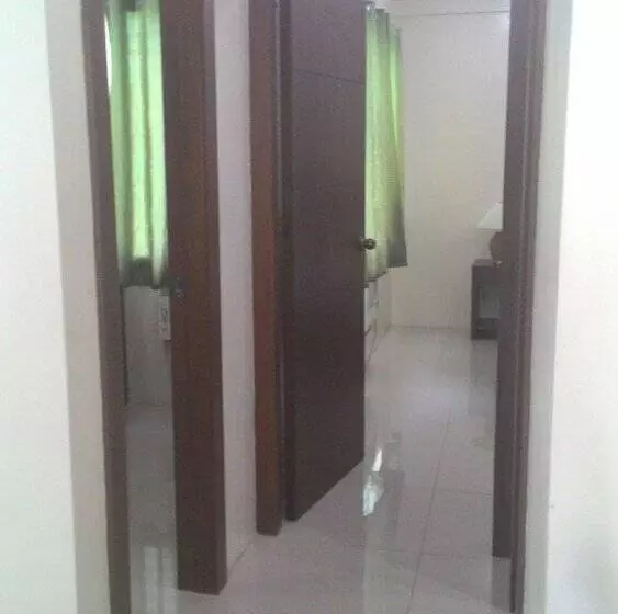 Joyce Apartelle San Juan