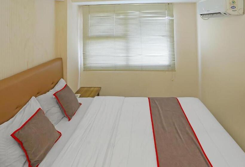 בית מלון כפרי Capital O 92625 19 Avenue Apartment