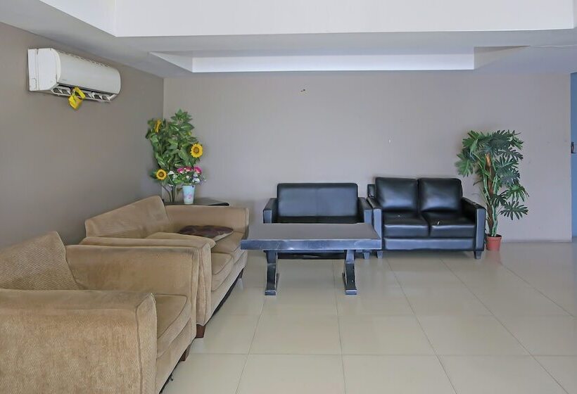 בית מלון כפרי Capital O 92625 19 Avenue Apartment