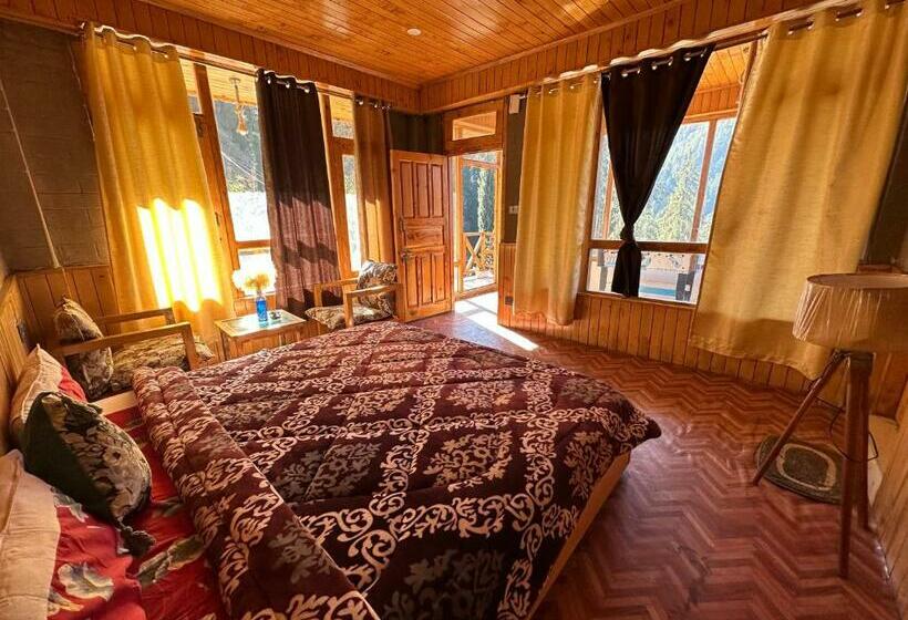 הוסטל Manzana Woodlet Cottage