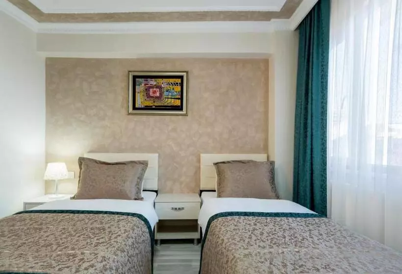 Atam Suites & Apart