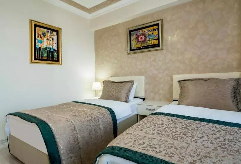 Atam Suites & Apart