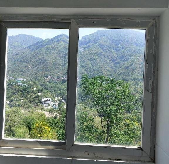 Отель Oyo Komfy Stayz