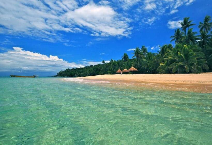 בית מלון כפרי Paradise Cove Resort