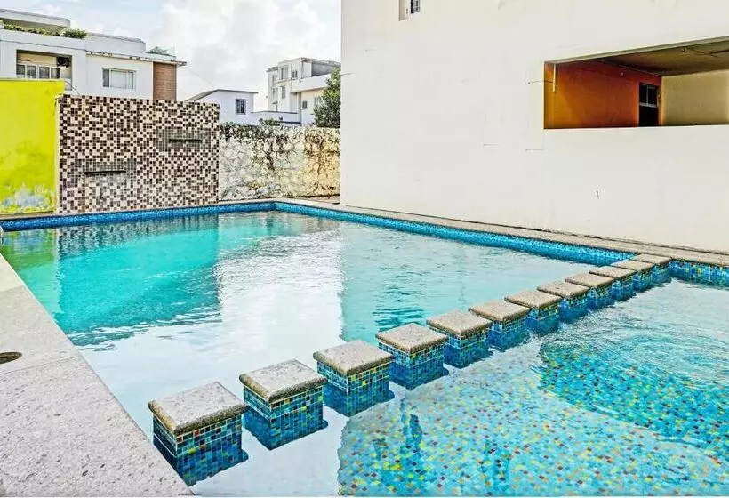 ホテル Oyo Flagship Ecr Goa Beach Resort