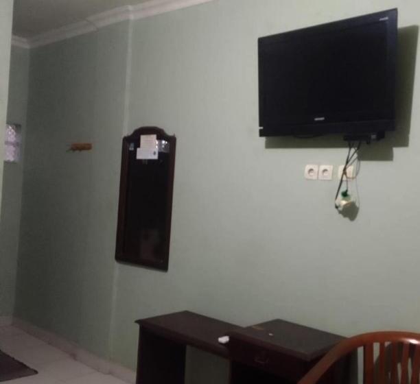 בית מלון כפרי Oyo 93286 Yellow House Syariah