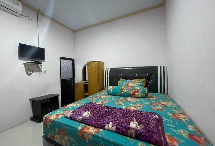 בית מלון כפרי Oyo 93308 Lima Saudara Syariah