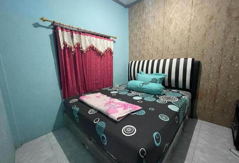 בית מלון כפרי Oyo 93308 Lima Saudara Syariah