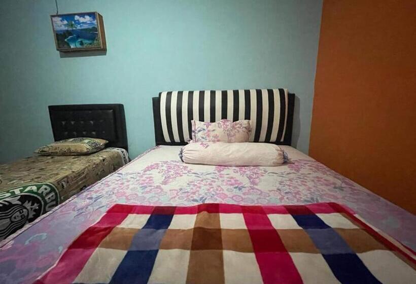 בית מלון כפרי Oyo 93308 Lima Saudara Syariah