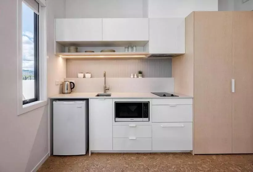 Hotelli Village Apartments At Nzcis