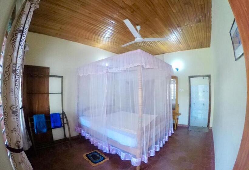 호텔 Moon Bridge Beach Resort