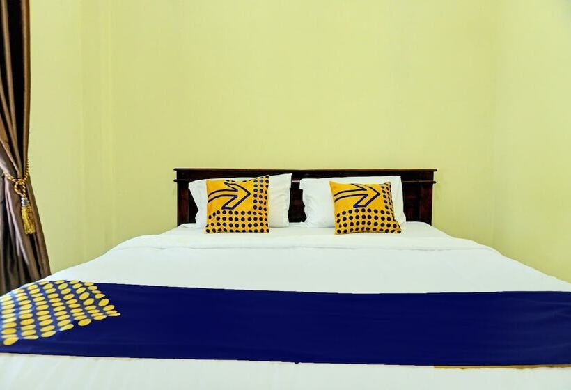 Отель Spot On 92392 Penginapan Vinccent22 Syariah