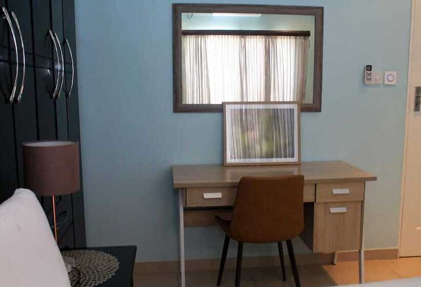 Pension (Hôtel basse catégorie) Serenity River Front Gardens Resort