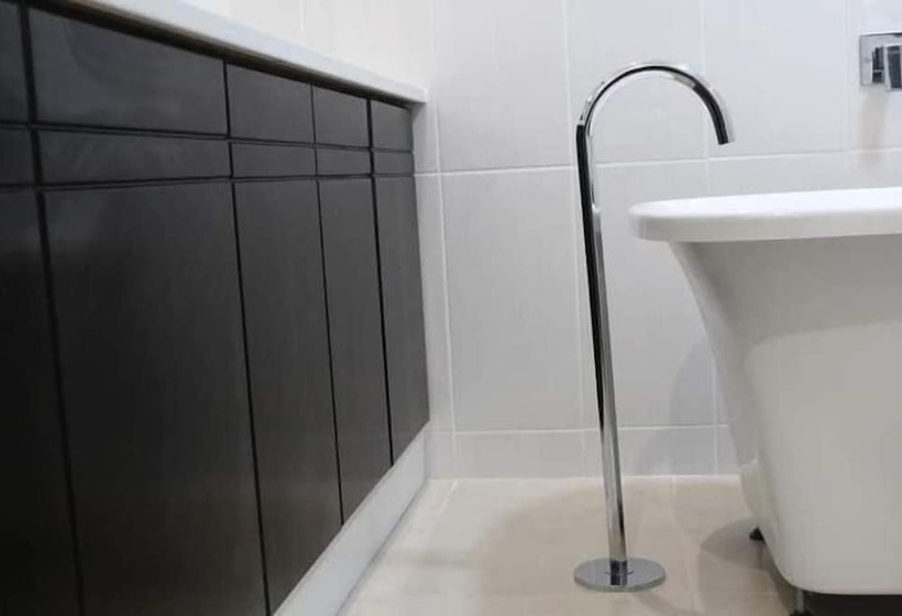 Pension (Hôtel basse catégorie) Serenity River Front Gardens Resort