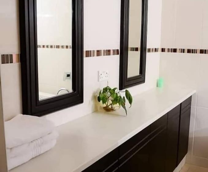 Pension (Hôtel basse catégorie) Serenity River Front Gardens Resort