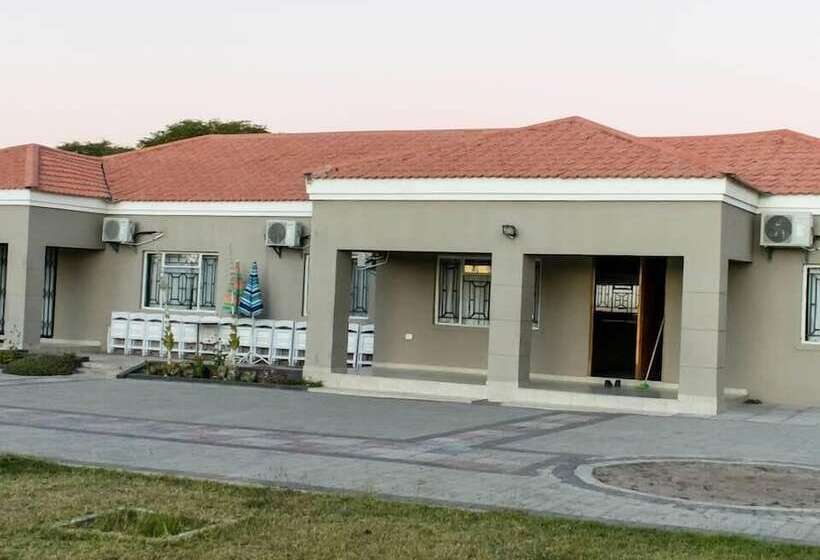 Pension (Hôtel basse catégorie) Serenity River Front Gardens Resort