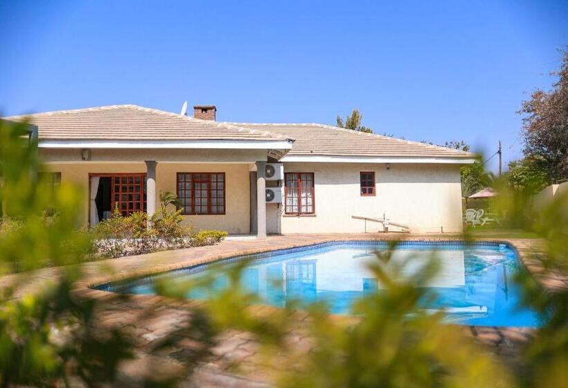 تختخواب و صبحانه Green Lagoon Guest House Tawana