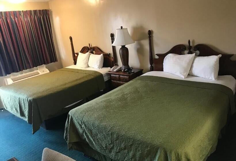 호텔 Travelers Inn