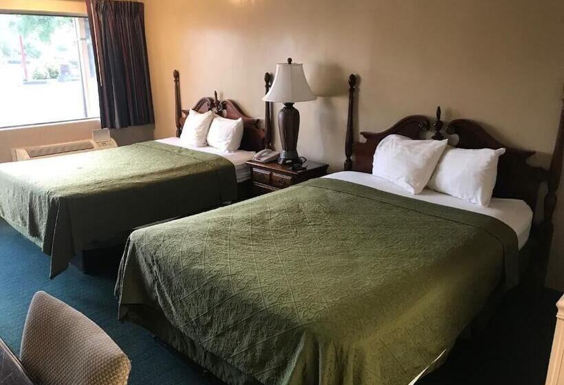 호텔 Travelers Inn