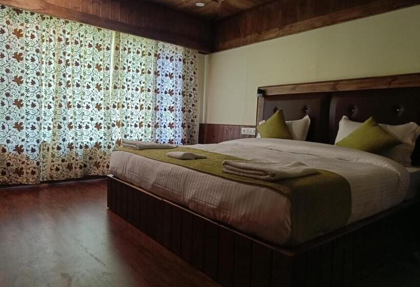 Hotell The Posh Residency