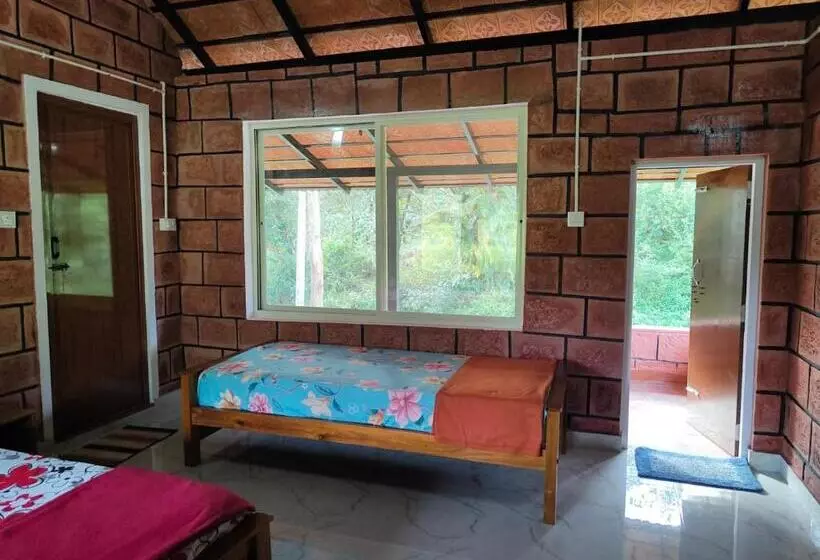 ペンション Nature Spot Cottages Coorg