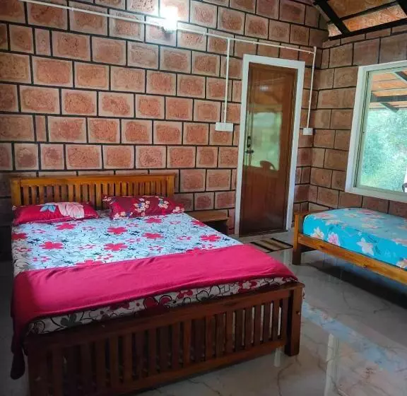 ペンション Nature Spot Cottages Coorg