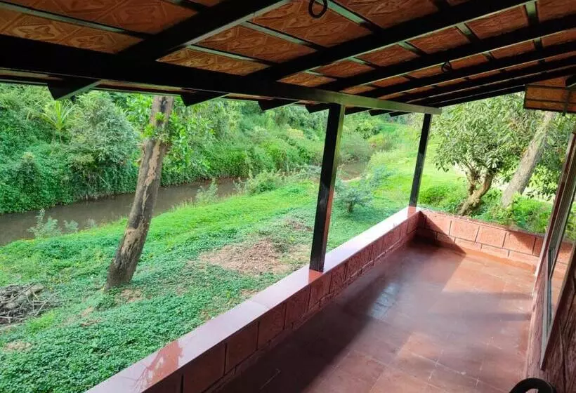 ペンション Nature Spot Cottages Coorg