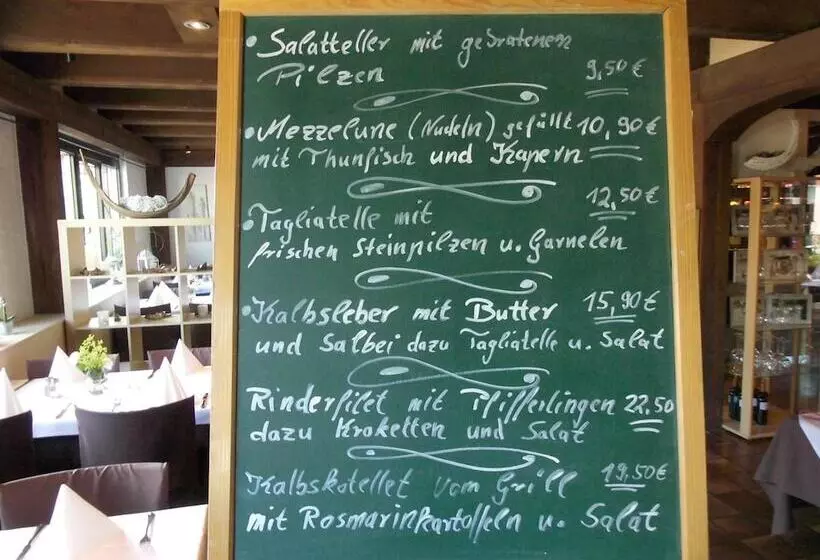 ホテル Donnici Im Schwyzerhusli